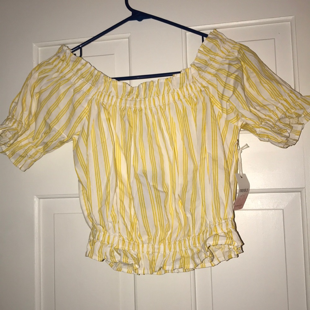 Yellow off shoulder shirt